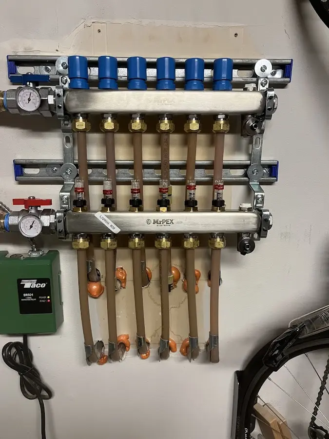 Plumber performing Gas Line Installation at a residential property in Medina